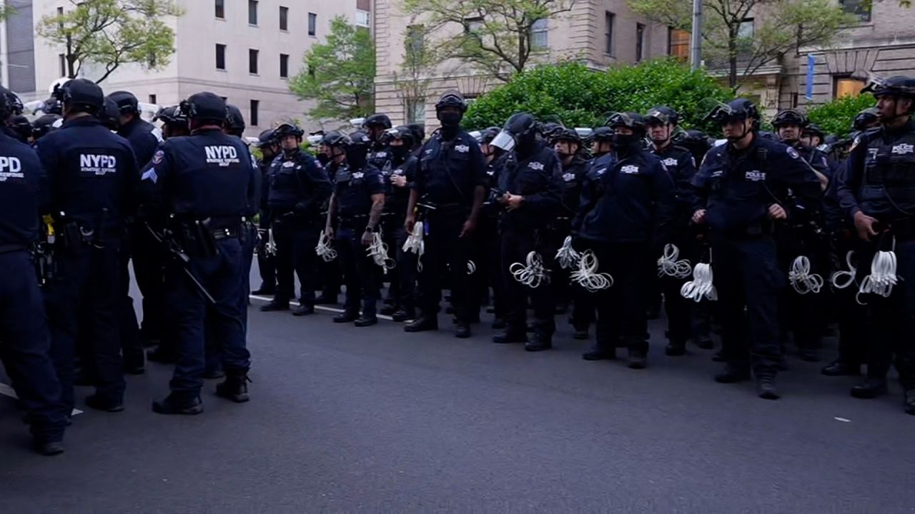 Officers from the New York Police Department’s Strategic Response Group congregate outside Columbia University’s campus in New York on Tuesday.