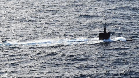(March 24, 2016) The Los Angeles-class attack submarine USS Helena (SSN 725) transits the Atlantic Ocean with the USS Dwight D. Eisenhower (CVN 69), the flagship of the Eisenhower Carrier Strike Group. Ike is underway conducting a Composite Training Unit Exercise (COMPTUEX) with the Eisenhower Carrier Strike Group in preparation for a future deployment.