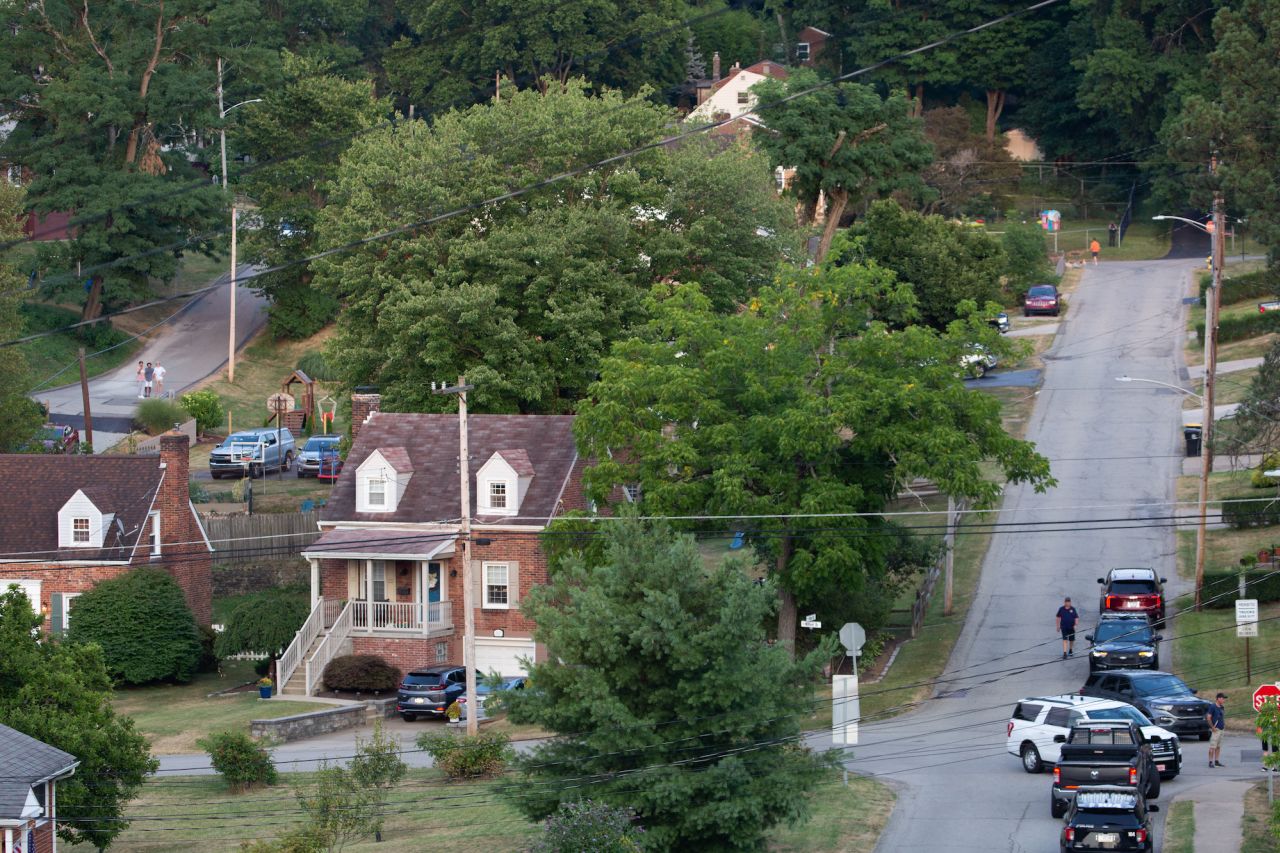 Police are seen around the home of Thomas Matthew Crooks as the FBI continues its investigation in Bethel Park, Pennsylvania, on July 14.