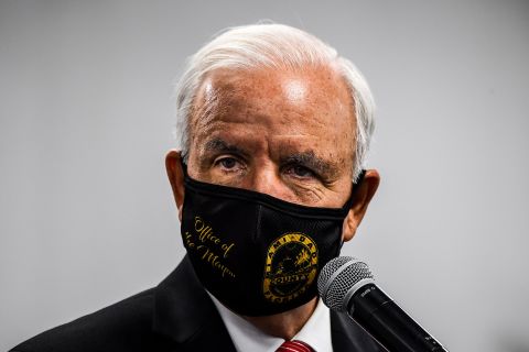 Miami-Dade County Mayor Carlos Gimenez wears a facemask during a press conference to address the rise of coronavirus cases in the state, at Jackson Memorial Hospital in Miami, on July 13.