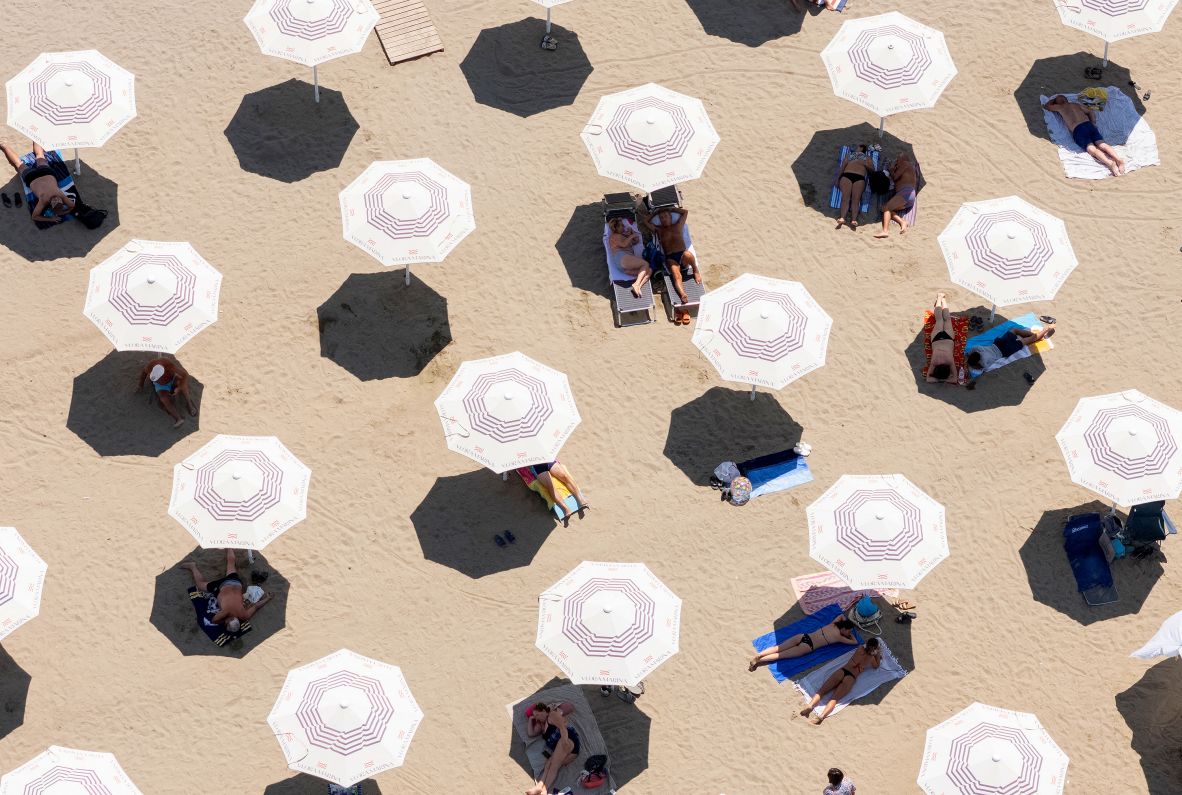 People enjoy a beach in Vlora, Albania, on Tuesday, June 24.