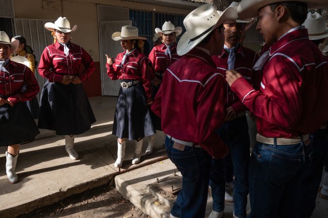 Dancers prepare for the annual Fiesta en La Misión celebration in La Misión, Mexico, on Saturday, May 24.