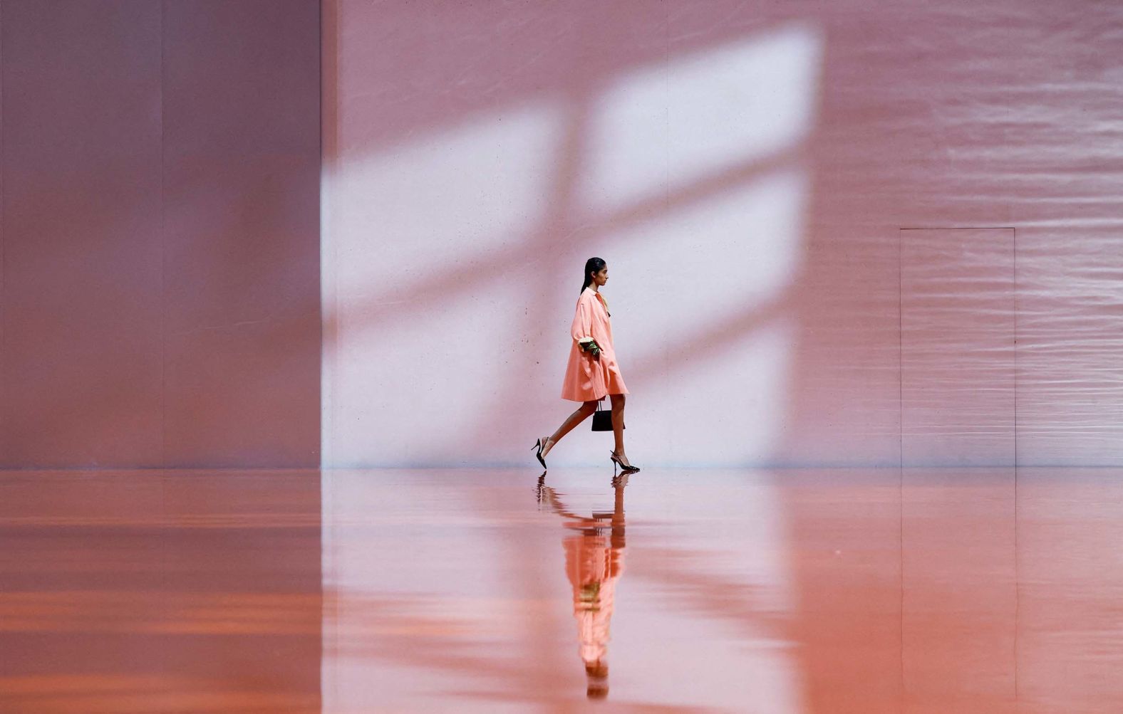 A model presents a creation from the Prada Spring-Summer 2026 collection during Milan Fashion Week on Thursday, September 25.