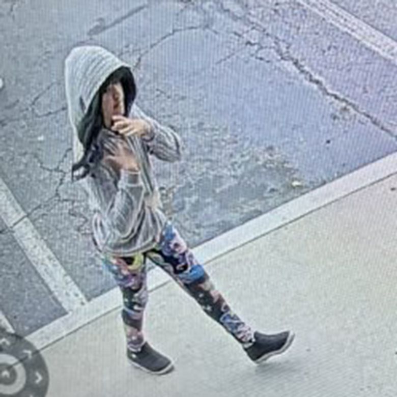 Surveillance images taken from a local car rental business on October 7 appear to show missing Melodee Buzzard wearing a wig.