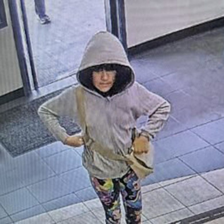 Surveillance images taken from a local car rental business on October 7 appear to show missing Melodee Buzzard wearing a wig.
