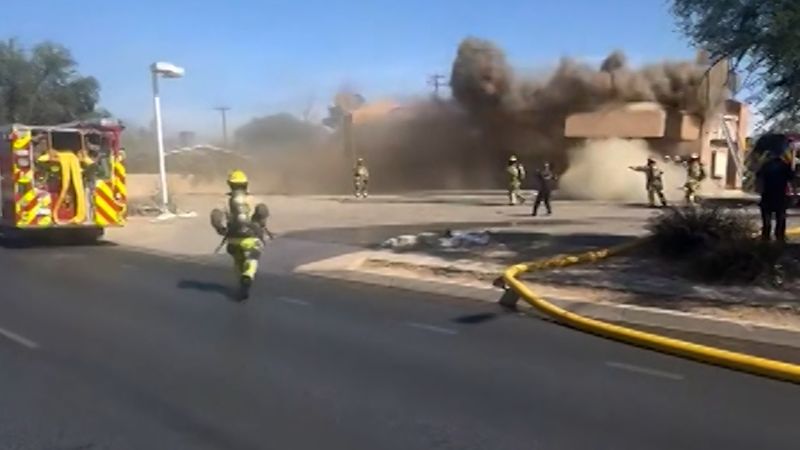 Tucson firefighters narrowly avoid disaster in roof collapse