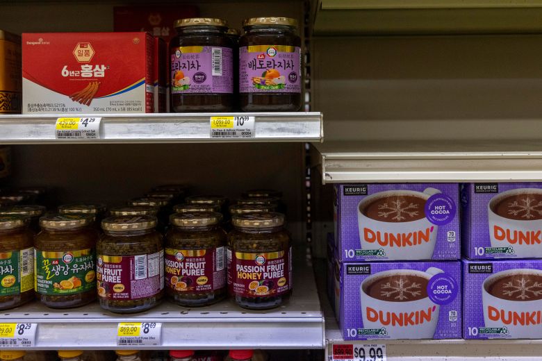 Asian food items are displayed near American food products on the shelves at Viet Huong Supermarket in Ellabell on Friday.