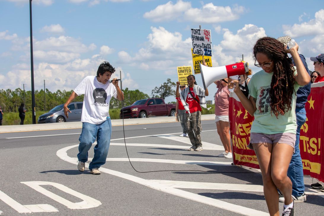Angel Cordova leads a chant during a protest outside of the Hyundai Motor Group Metaplant America in Ellabell on Saturday.