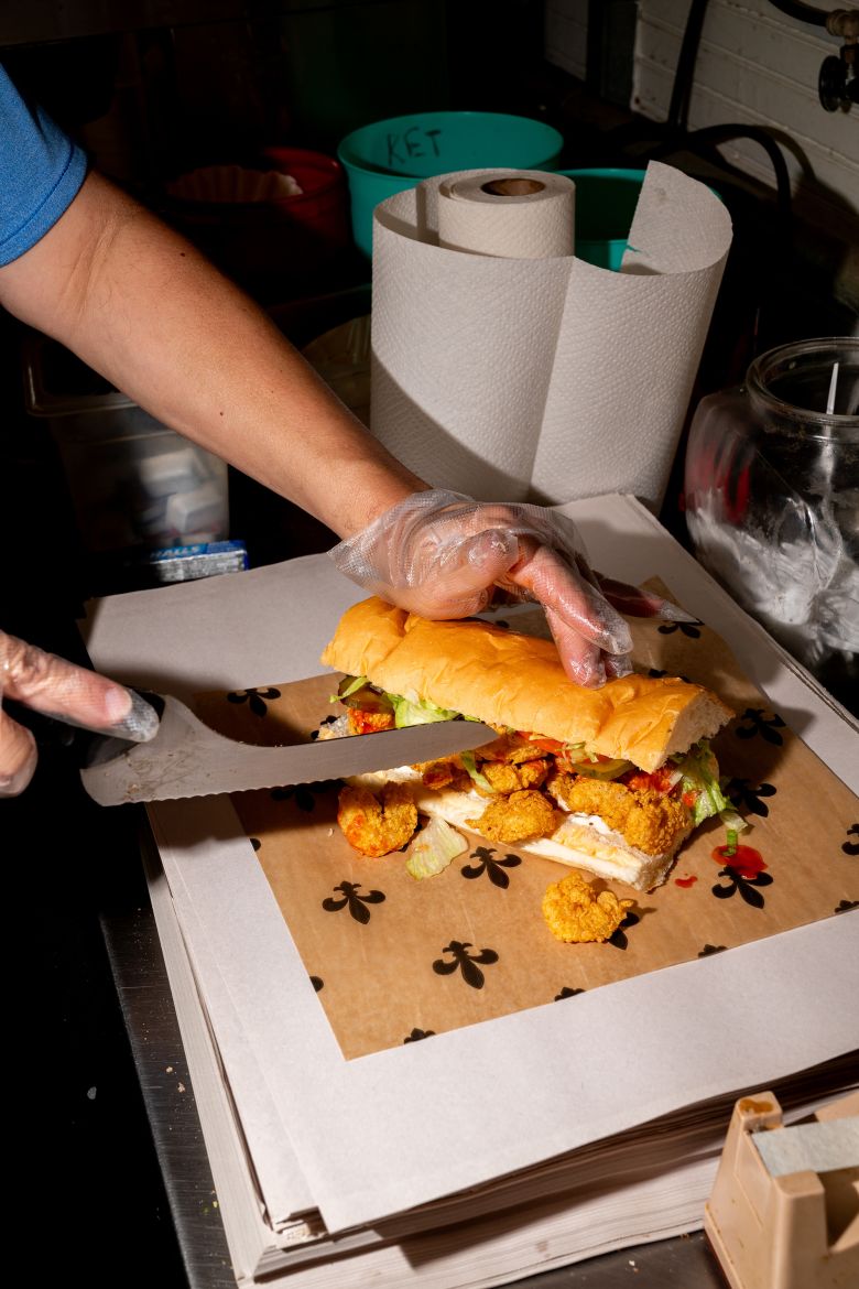 Kirk Frady assembles a mouth-watering shrimp po-boy at Frady's One Stop.