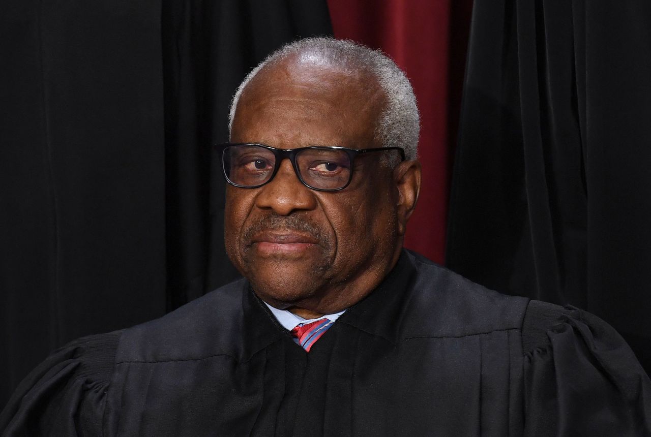 Justice Clarence Thomas poses for photos in Washington, DC, in 2022.