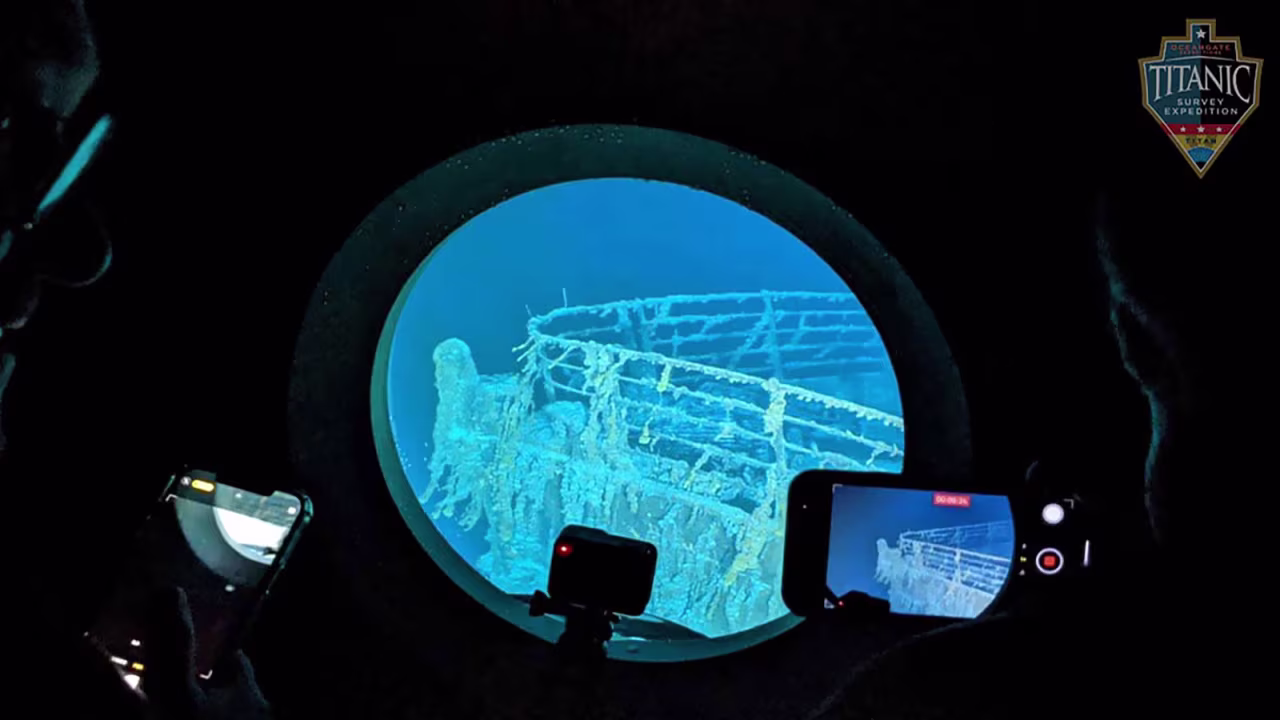 An undated file photo shows the RMS Titanic shipwreck from a viewport of an OceanGate Expeditions submersible.