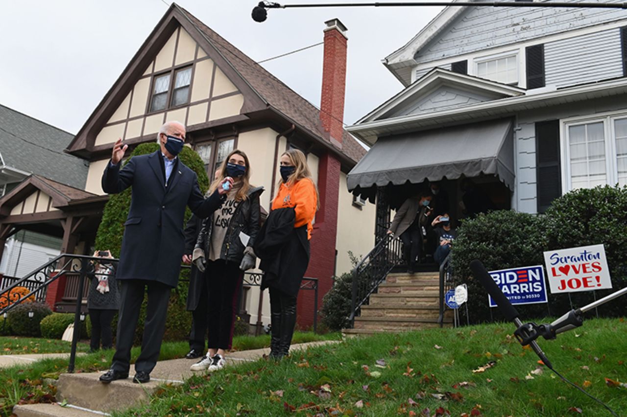 Democratic presidential candidate Joe Biden visits his childhood home with his granddaughters in Scranton, Pennsylvania on November 3, 2020. 