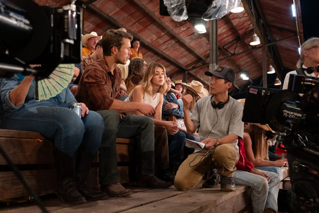 Glen Powell, Daisy Edgar-Jones receive direction from Lee Isaac Chung on the set of 