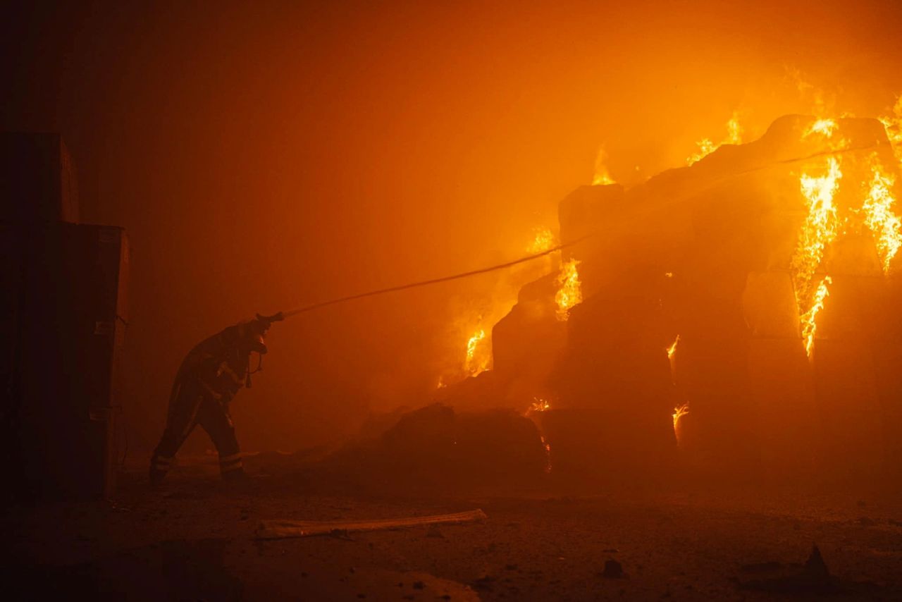 A firefighter works at a site of a tobacco factory damaged during Russian drone strike in?Kyiv, Ukraine on May 28.
