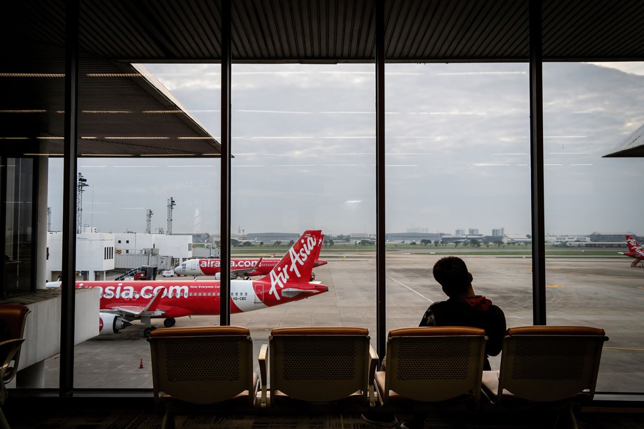 Air Asia flights are seen at Don Mueang International Airport (DMK) in Bangkok on November 23, 2022.