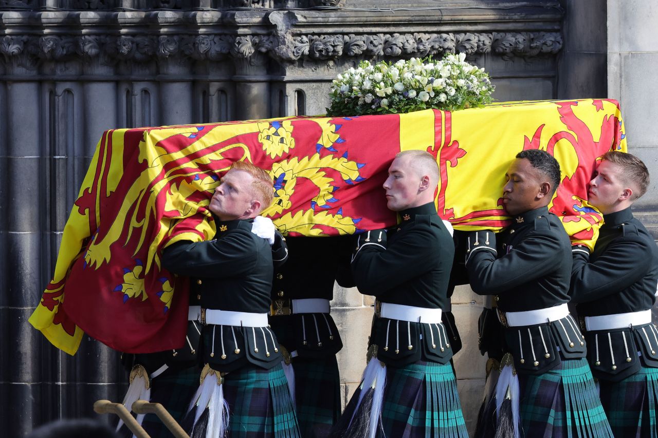 The coffin of Queen Elizabeth is carried into St Giles Cathedral on Monday.