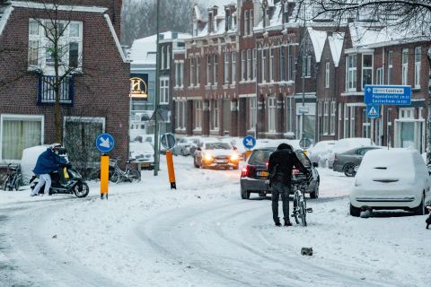 People travel in the snow on February 7 in Dordrecht, Netherlands.