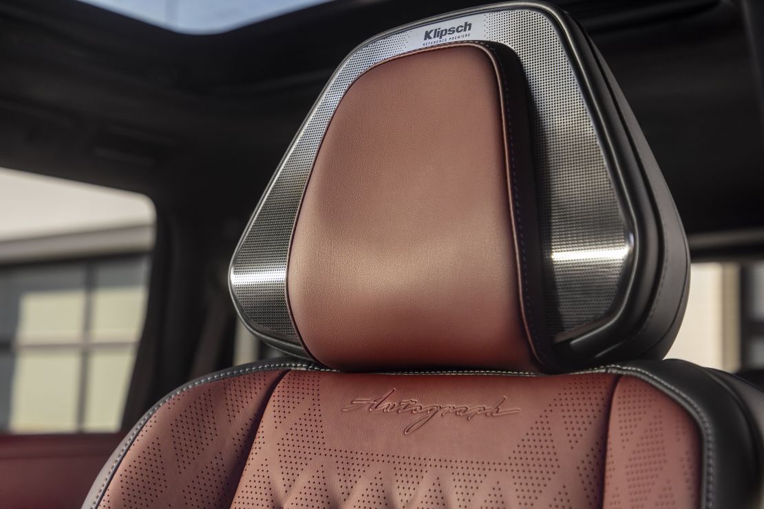 Headrest-mounted speakers are a critical ingredient in the Infiniti QX80's privacy-guarding stereo.