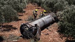 Members of the Israeli special forces check the apparent remains of a ballistic missile lying on the ground before being evacuated from the location where they were found, following missile attacks by Iran on Israel, in northern Israel, June 18, 2025. REUTERS/Gil Eliyahu ISRAEL OUT. NO COMMERCIAL OR EDITORIAL SALES IN ISRAEL.     TPX IMAGES OF THE DAY     