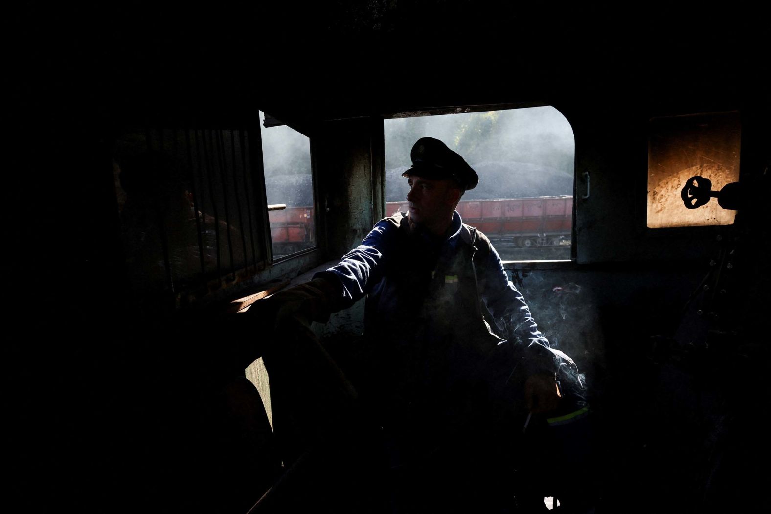 Nermin Husanovic operates a steam locomotive that is still used to transport coal in the Banovići mine in Bosnia and Herzegovina on Thursday, October 9.