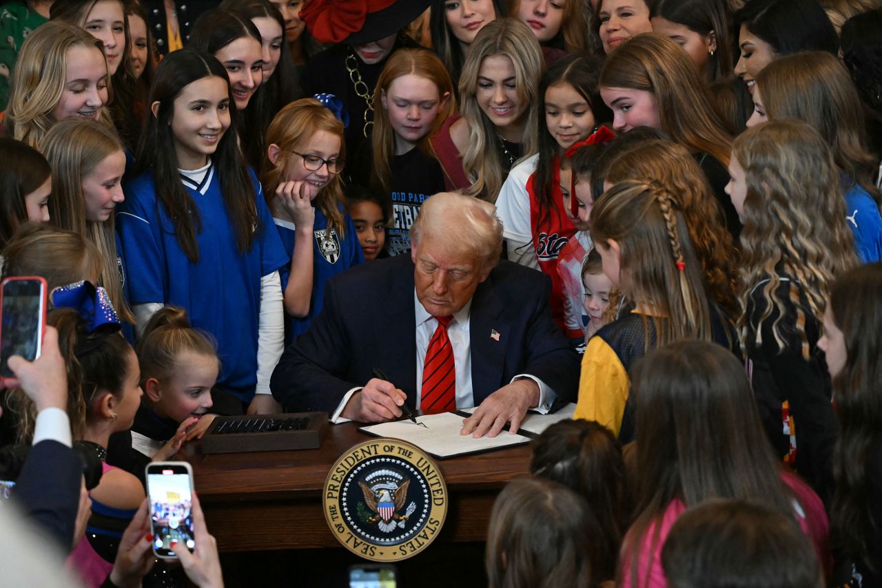 President Donald Trump signs the No Men in Women's Sports Executive Order into law in the East Room of the White House in Washington, DC, on February 5, 2025.