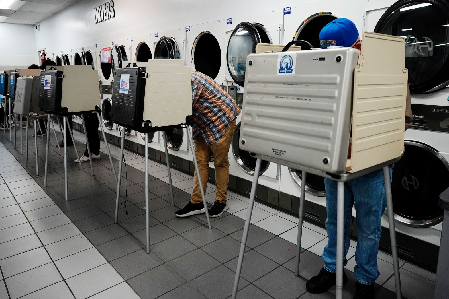 Voters cast their ballots at a laundromat in Chicago on Tuesday.