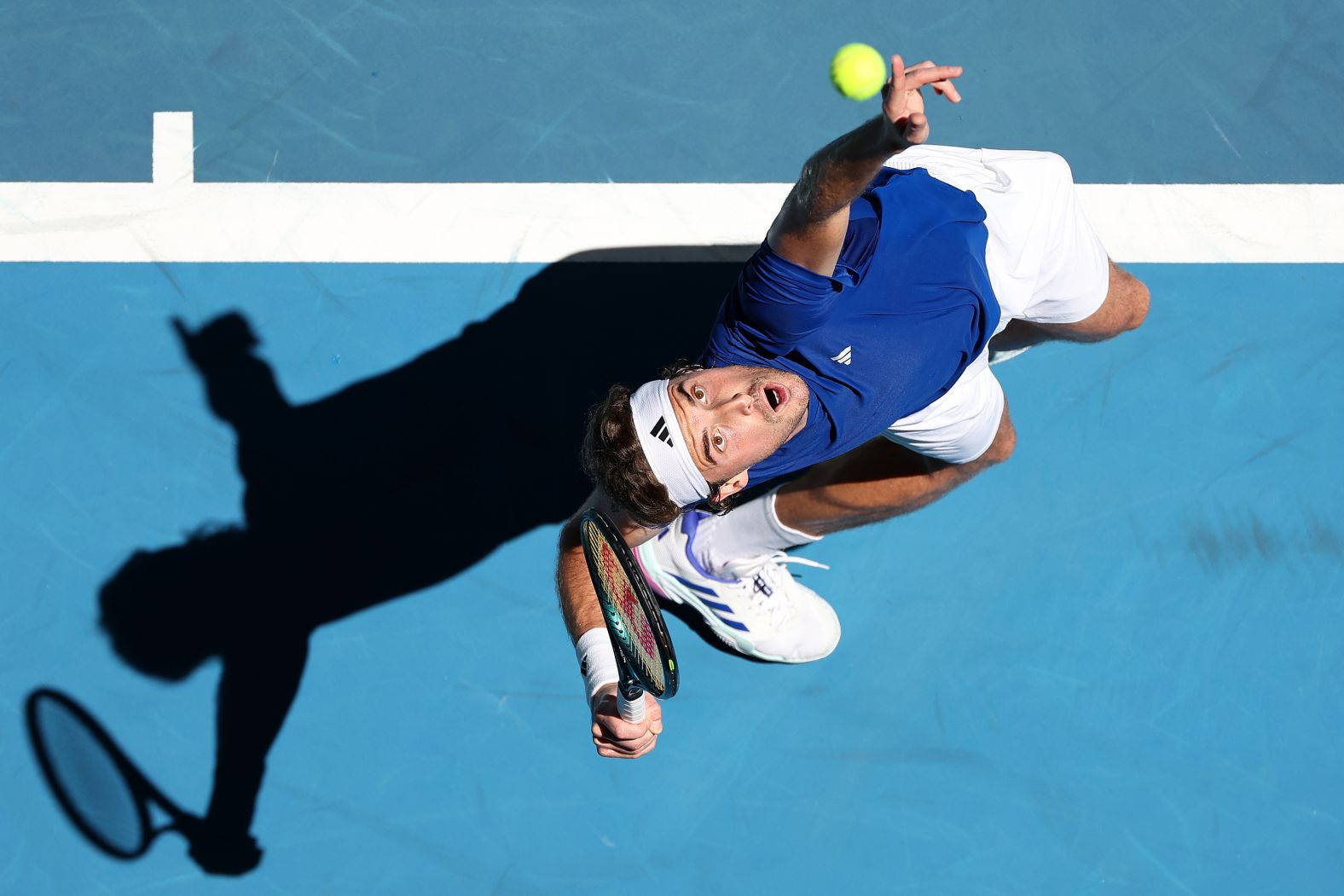 Stefanos Tsitsipas serves the ball during a singles match at the United Cup in Perth, Australia, on Monday, December 30.