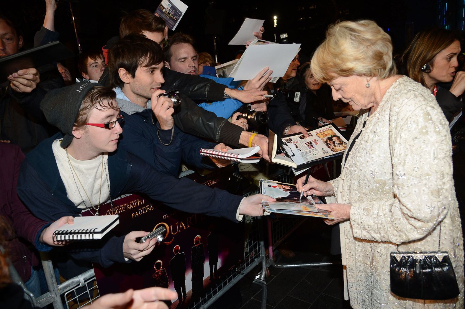 Smith signs autographs at the BFI London Film Festival in 2012.