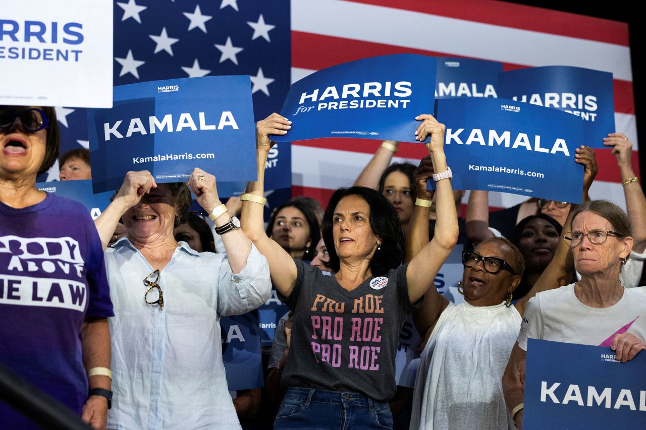 Supporters hold signs at a rally in support of Vice President Kamala Harris' Democratic presidential election campaign in Ambler, Pennsylvania, on July 29.