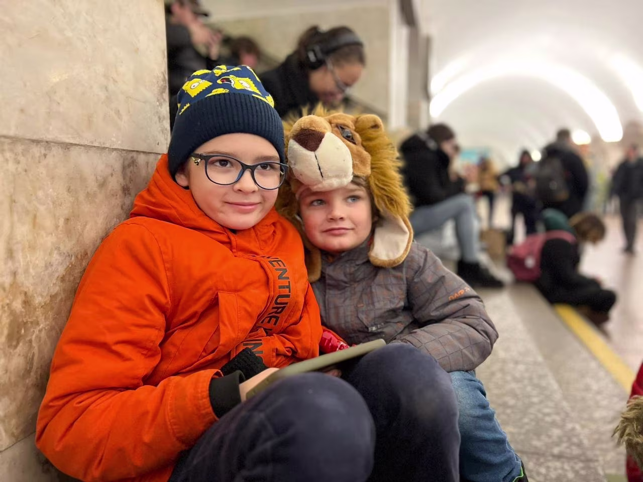 Families shelter in a metro station in Kyiv, Ukraine, on December 31. 