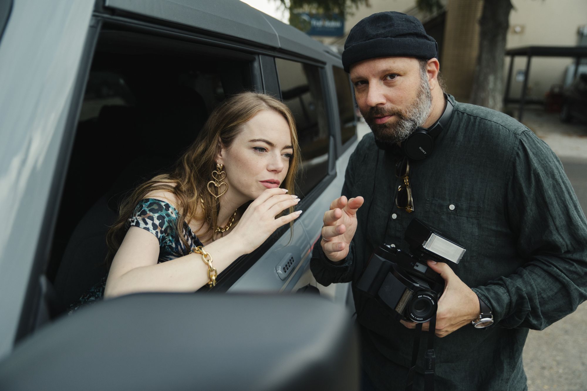Emma Stone and Yorgos Lanthimos on the set of "Kinds of Kindness." It is the fourth time the pair have worked together.