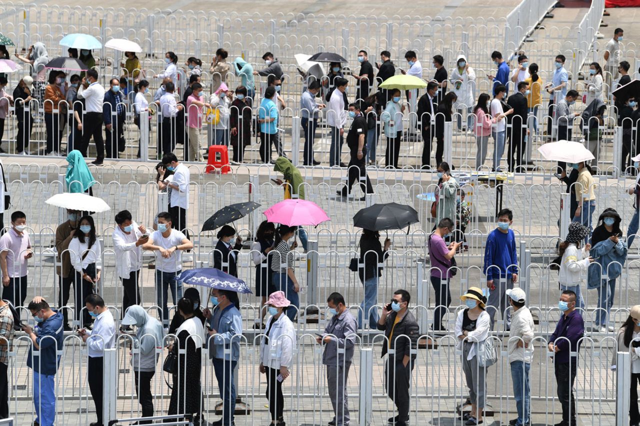 Residents queue to receive Covid-19 vaccines at Hefei Olympic Sports Center on May 17 in Anhui province, China.