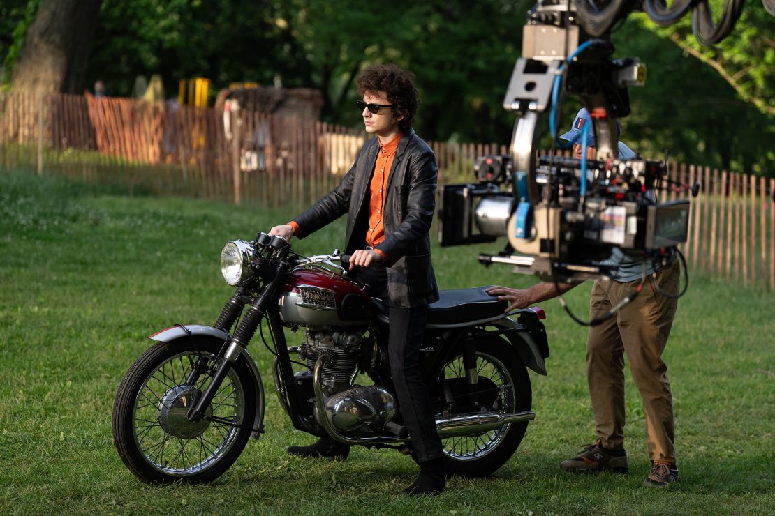 Phillips replicated Dylan's red shirt and leather jacket combination for his controversial 1965 Newport Folk Festival performance.