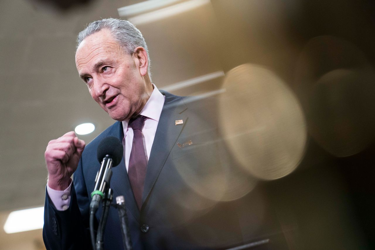 Minority Leader Sen. Chuck Schumer to reporters near the Senate subway in the U.S. Capitol on February 3.