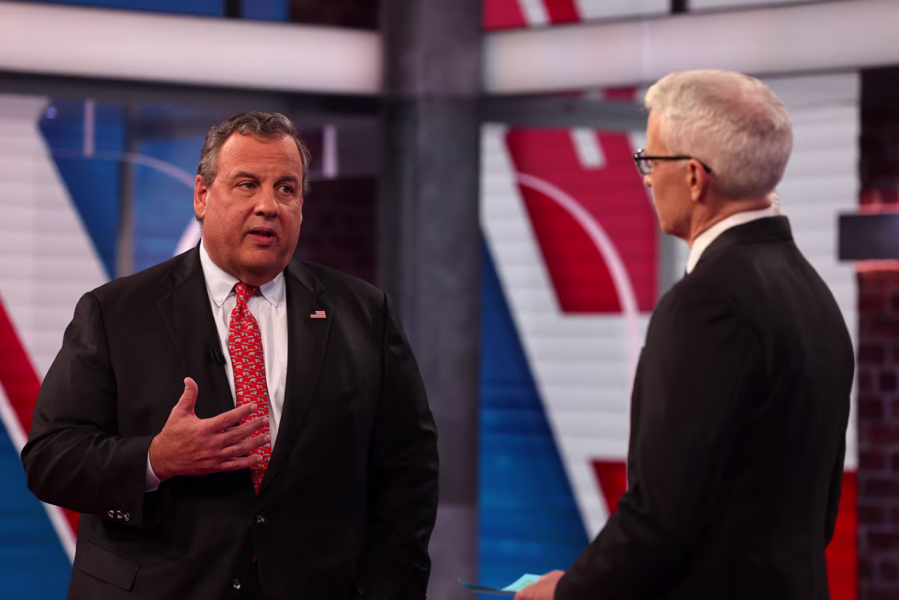 Christie speaks with CNN's Anderson Cooper at the start of the town hall. 
