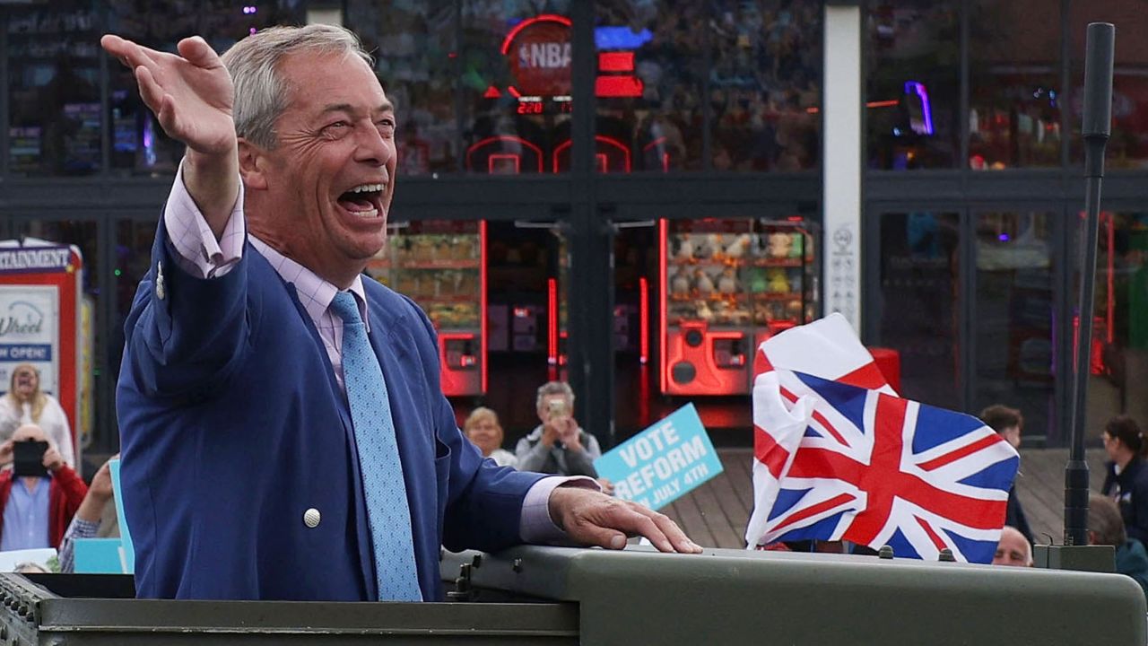 Reform UK party leader Nigel Farage arrives to deliver a stump speech to supporters on July 3, in Clacton-on-Sea, England. 