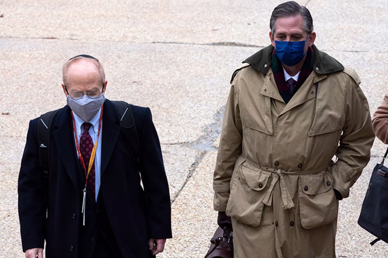 David Schoen and Bruce Castor, lawyers for former President Donald Trump, arrive at the Capitol on the third day of the second impeachment trial of Trump in the Senate, Thursday, February. 11.
