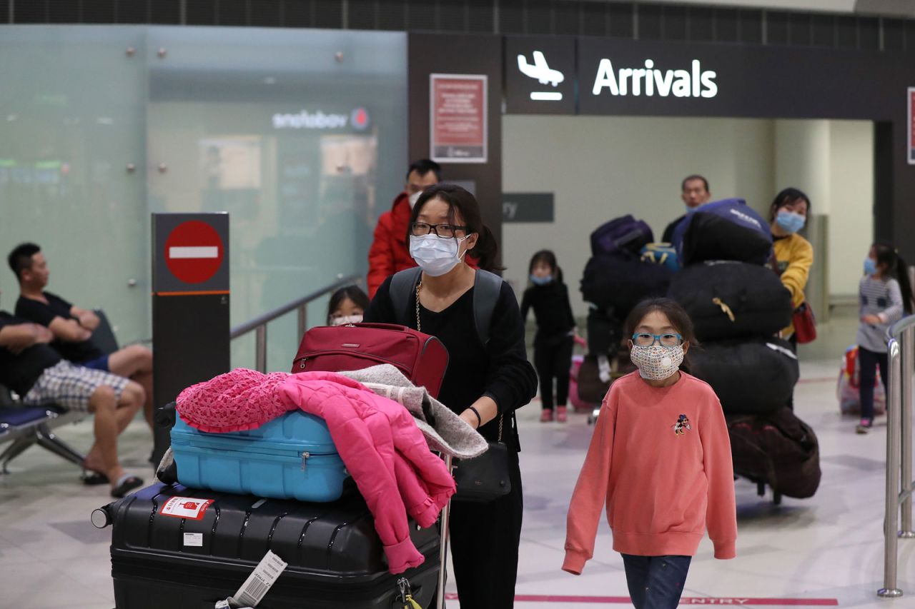 Passengers of a China Southern Airlines flight arrive at Perth International Airport in Australia on February 2