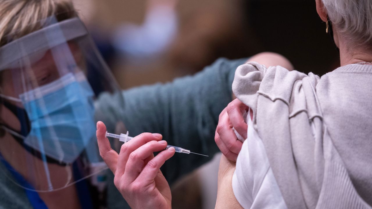 A Covid-19 vaccine is administered in Seattle on Sunday.