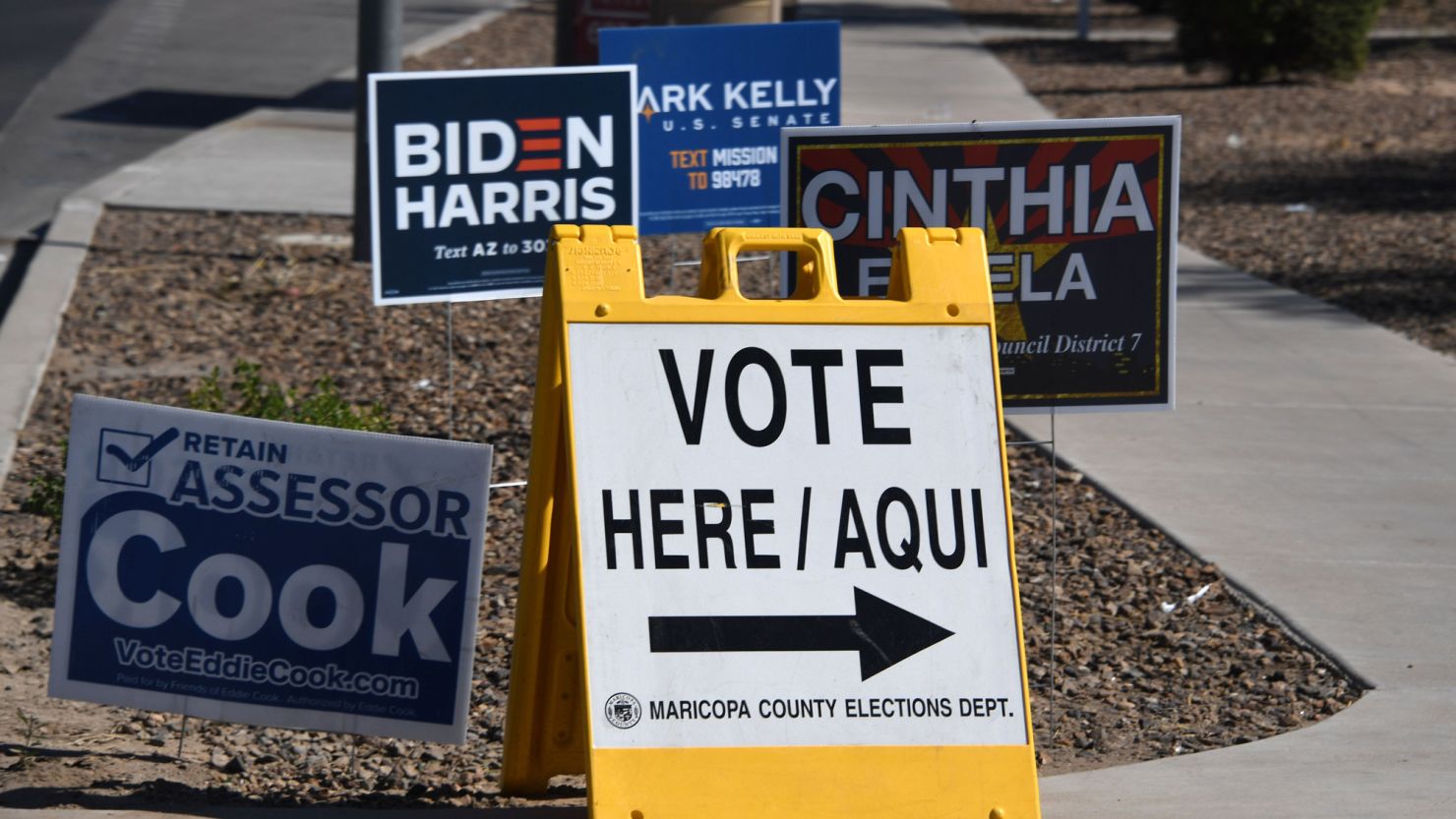 A sign points the way to an early voting location in Phoenix, Arizona, on October 16.