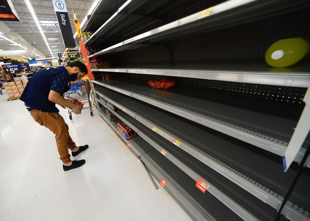 Florida residents have emptied shelves at Walmart on August 29, 2019 in Orlando as they prepare for Dorian.