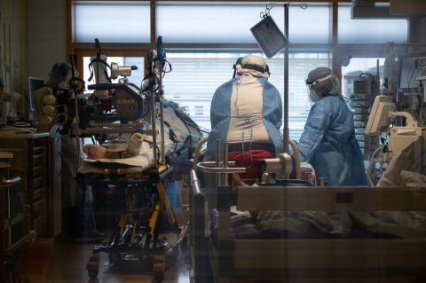 Medical staff take care of a Covid-19 patient in the intensive care unit of a hospital in Ludwigsburg, Germany, on January 8.