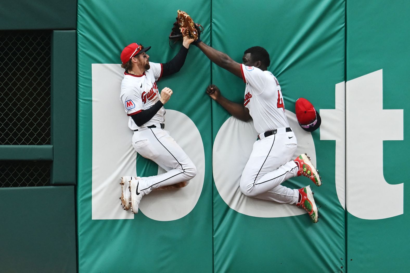 Cleveland Guardians center fielder Daniel Schneemann, left, and right fielder Jhonkensy Noel go for a ball hit by Minnesota’s Byron Buxton during a Major League Baseball game in Cleveland on Thursday, May 1. Schneemann made the catch.