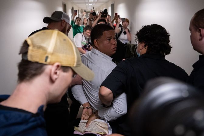 A man is detained by officers with Immigration and Customs Enforcement (ICE) after an immigration court hearing in New York on Friday, June 6. ICE agents have shown up at routine immigration checks, immigration courts and worksites, among other locations. <a  target="_top" href="/newspapers?url=https://www.cnn.com/2025/06/10/politics/ice-scrambles-immigration-arrest-quotas">The speed at which agents are trying to arrest migrants in the United States</a> has raised alarm among immigrant advocates and former ICE officials.