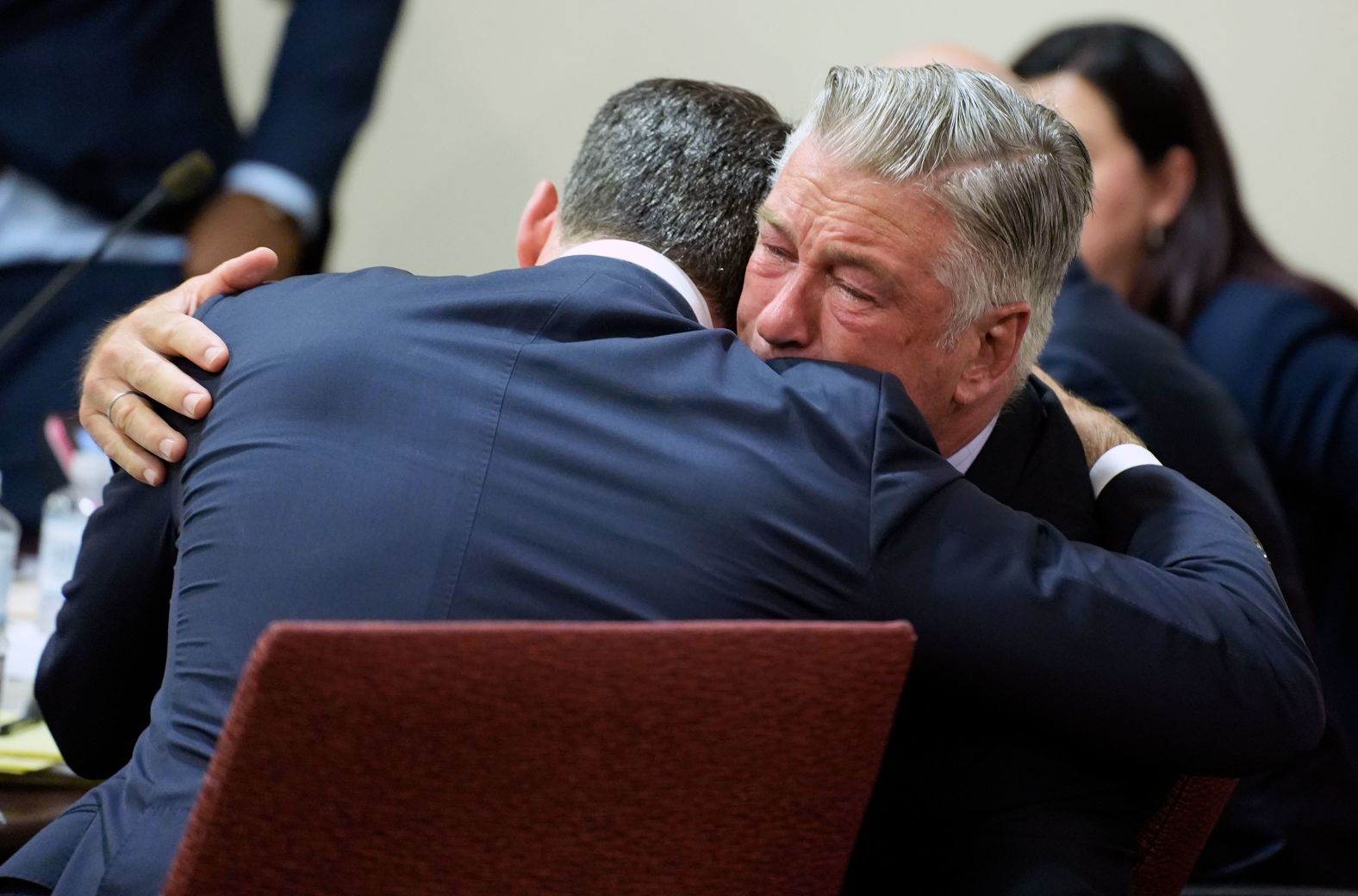 Actor Alec Baldwin, right, hugs attorney Alex Spiro at the conclusion of his involuntary manslaughter trial in Santa Fe, New Mexico, on Friday, July 12. <a href="index.php?page=&url=https%3A%2F%2Fwww.cnn.com%2F2024%2F07%2F12%2Fentertainment%2Falec-baldwin-trial-rust%2Findex.html">The case was dismissed in dramatic fashion</a> after the judge overseeing the case ruled prosecutors did not properly turn over evidence to the defense.