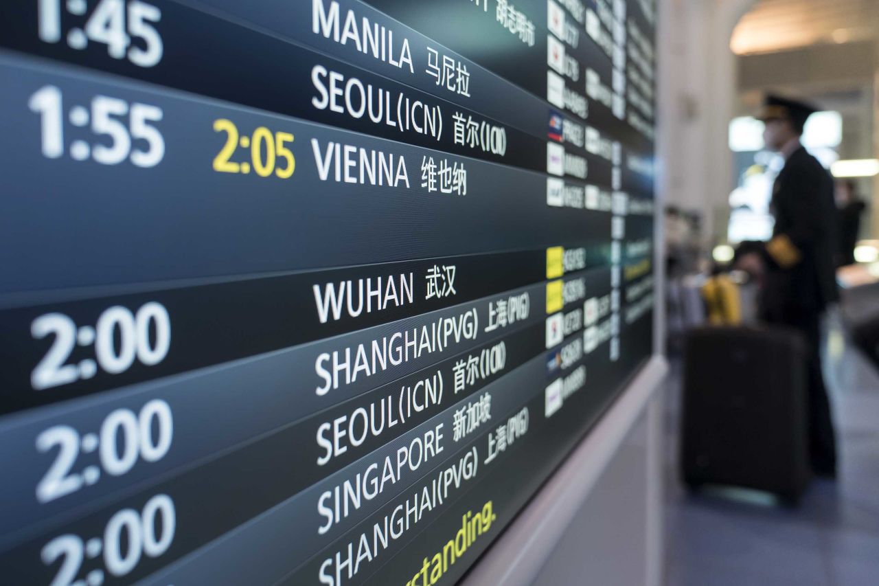 A board displays airline departure information at Haneda airport in Tokyo, Japan, on January 31.