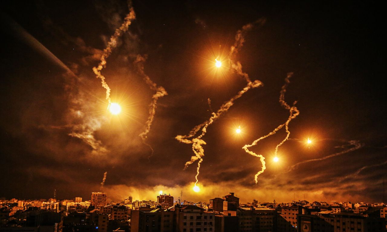 Flares fired by the Israeli army illuminate the sky over Al-Shati refugee camp in Gaza on November 6.