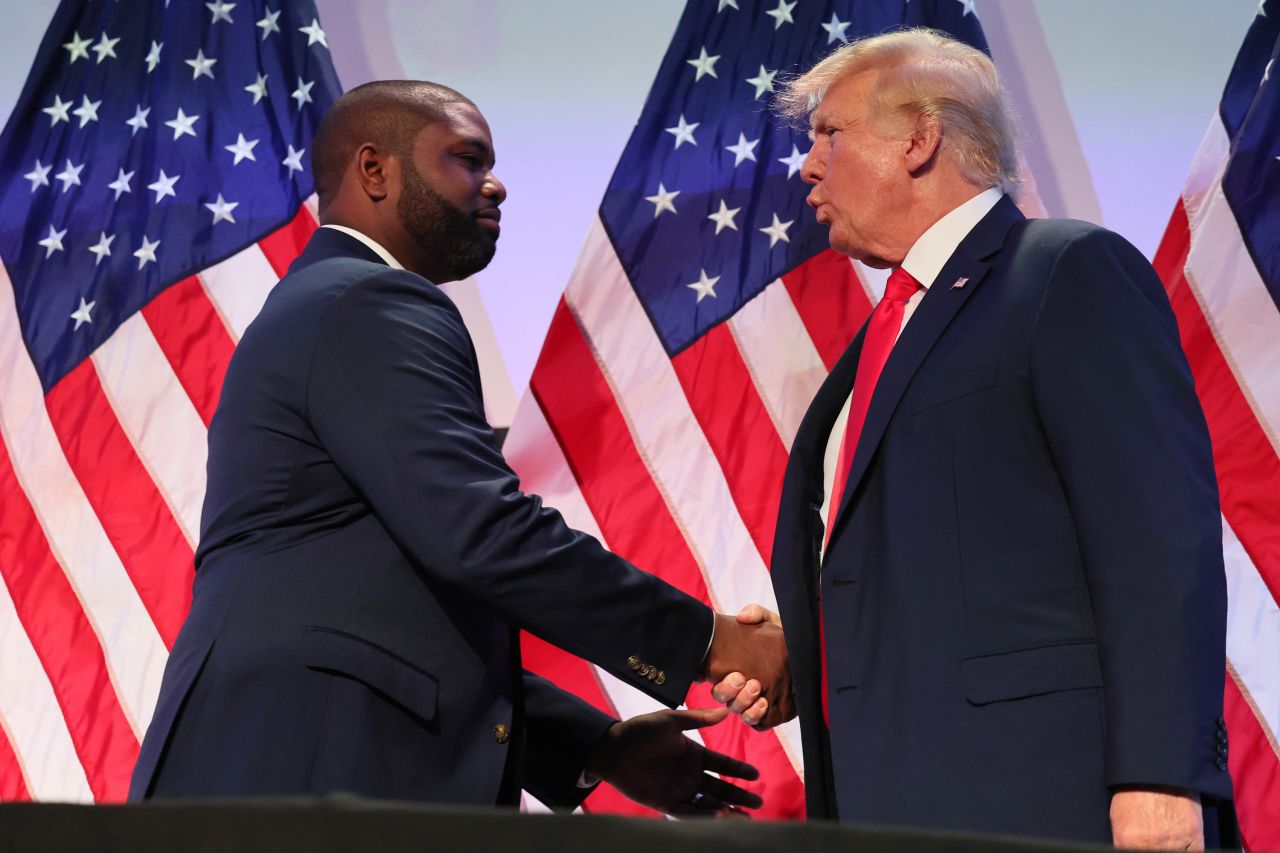 Republican Rep. Byron Donalds shakes hands with former President Donald Trump during an event in Philadelphia, Pennsylvania, in June 2023. 