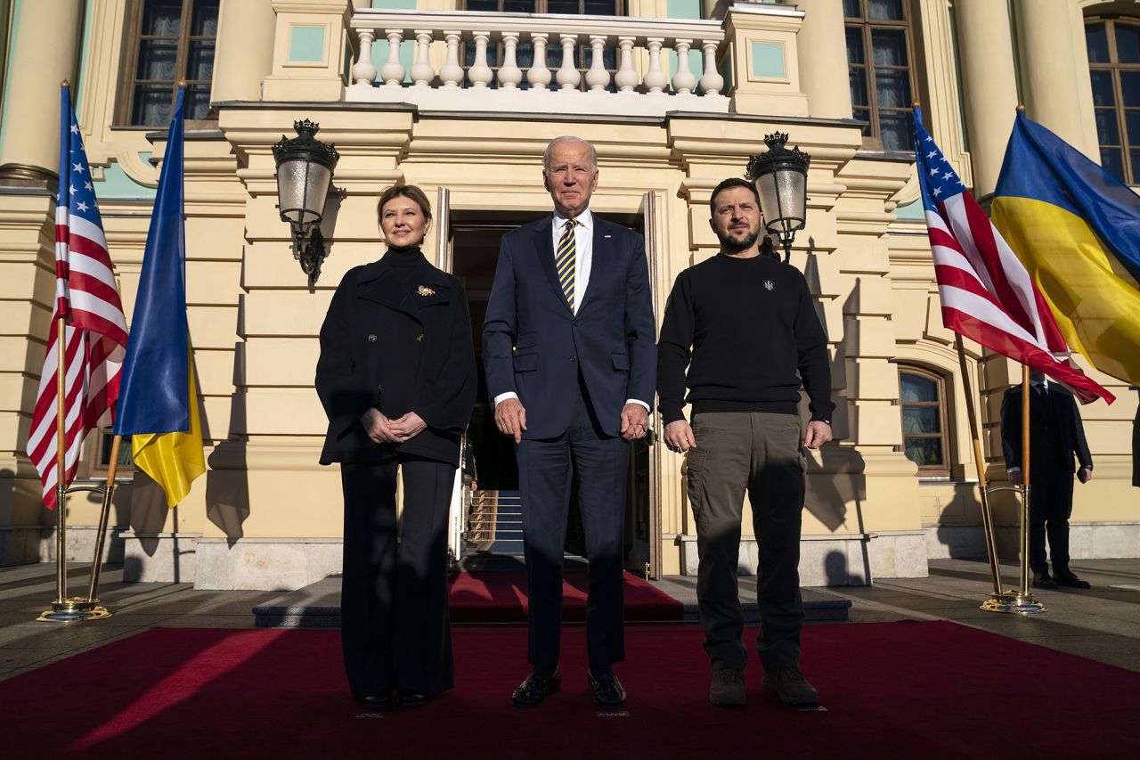 Biden poses with Ukrainian counterpart Zelensky and first lady Olena Zelenska at Mariinsky Palace during the unannounced visit on February 20.