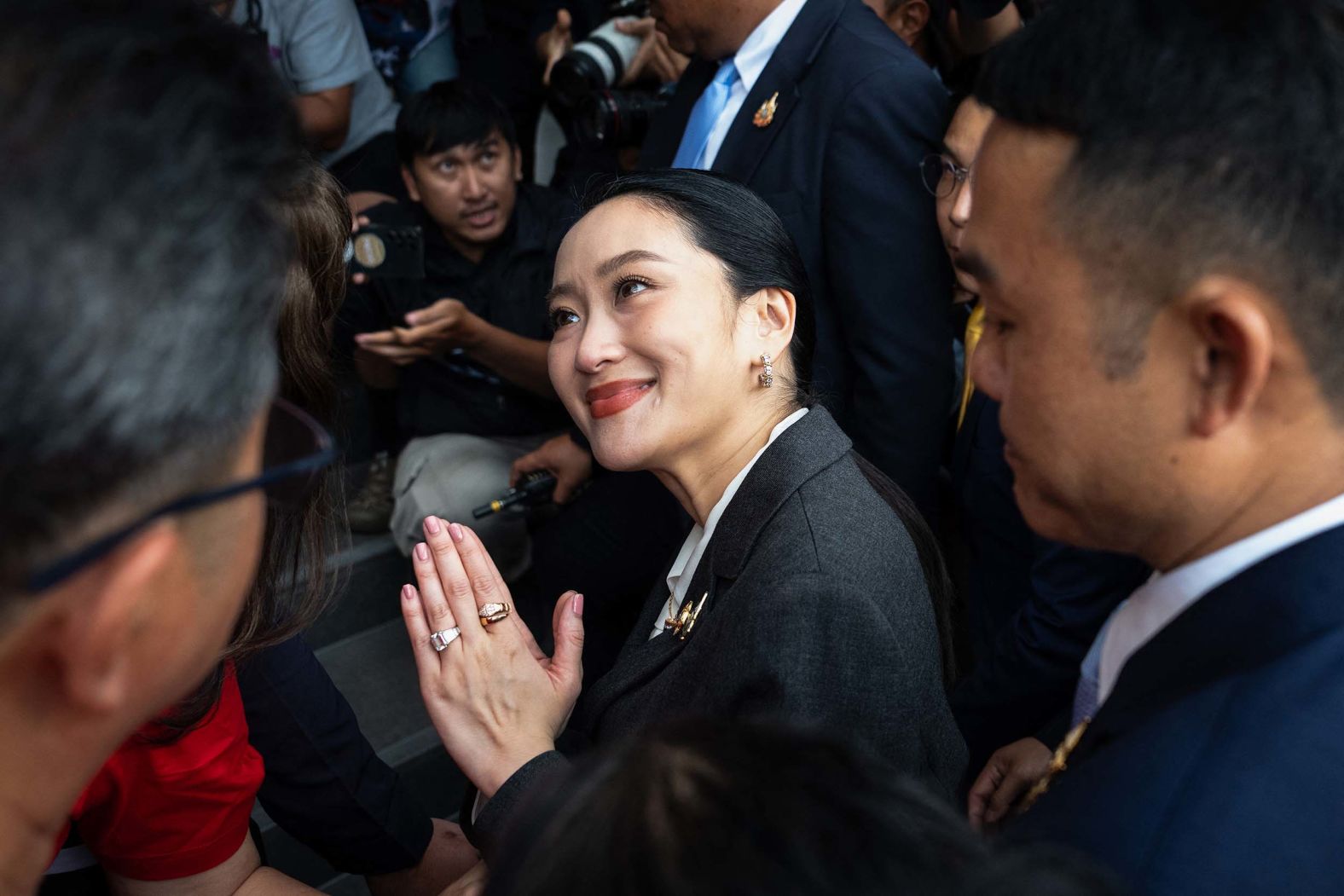 Paetongtarn Shinawatra greets supporters in Bangkok, Thailand, after a court <a href="index.php?page=&url=https%3A%2F%2Fwww.cnn.com%2F2025%2F08%2F29%2Fasia%2Fthailand-paetongtarn-shinawatra-court-hnk-intl">removed her as the country’s prime minister</a> on Friday, August 29. The court ruled that her controversial phone call with Cambodia’s former leader breached ethics rules.